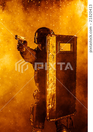 police officer with ballistic shield 21820413