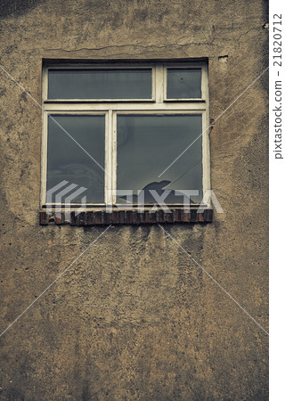 broken glass window reflecting clounding sky broken glass window reflecting clounding sky 21820712