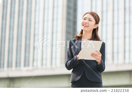 Woman business watching tablet 21822158