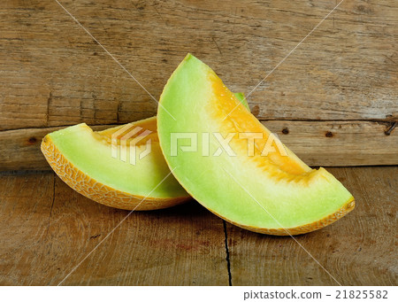 cantaloupe melon on the wooden background 21825582