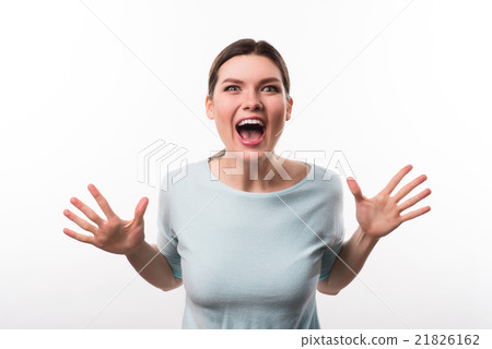 Jubilant girl standing isolated on white Jubilant girl standing isolated on white 21826162