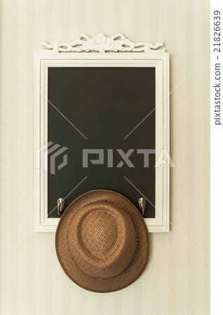 Vintage slate chalk board with brown hat Vintage slate chalk board with brown hat 21826639