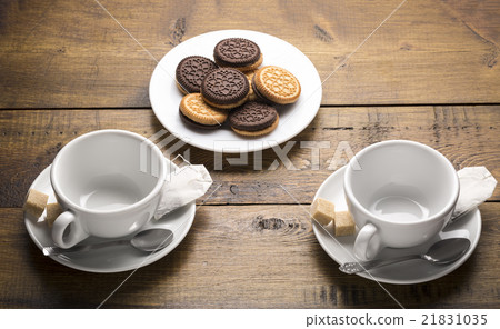 Set of two ceramic tea mugs with teabags 21831035