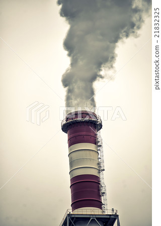 Chimneys with dramatic clouds of smoke 21832325
