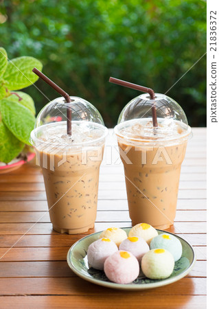 Iced coffee with straw Iced coffee with straw 21836372