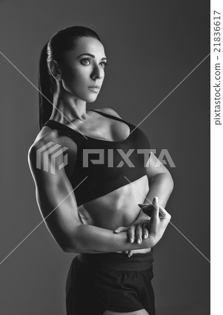 Sporty girl with muscles Sporty girl with muscles 21836617