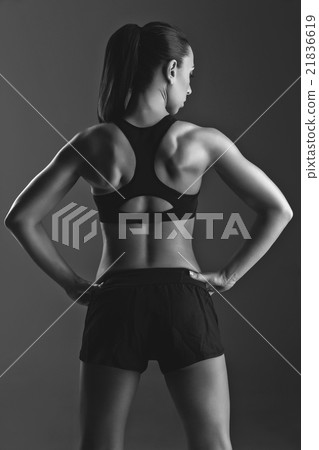 Sporty girl with muscles 21836619