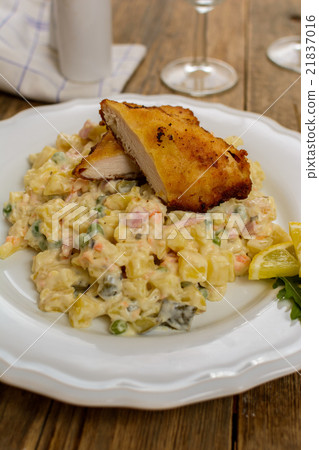 Wiener schnitzel with potato salad Wiener schnitzel with potato salad 21837016