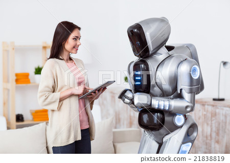 Positive girl standing with the robot  21838819
