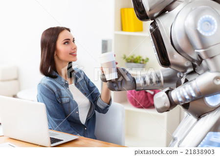 Nice girl sitting at the table Nice girl sitting at the table 21838903