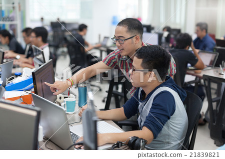 Asian Colleagues Software Developers Team Sitting 21839821