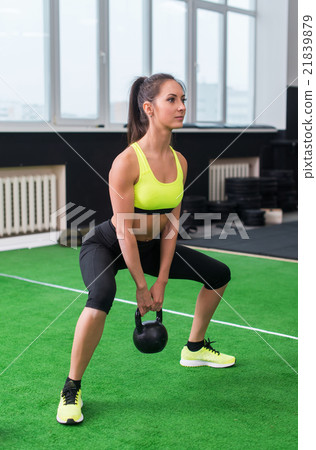 side view portrait of an athlete woman doing side view portrait of an athlete woman doing 21839879