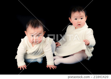 Cute twin baby, black background 21841420