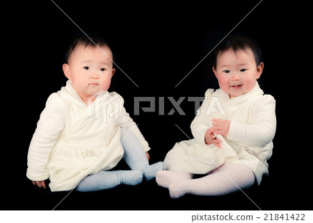 Cute twin baby, black background 21841422