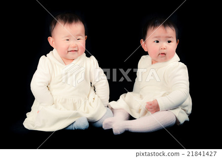 Cute twin baby, black background 21841427
