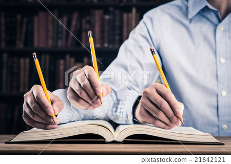 Male hand with pencil Male hand with pencil 21842121