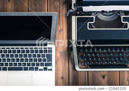 Typewriters and laptops, past and present, analog and digital, era, comparison Typewriters and laptops, past and present, analog and digital, era, comparison 21842320