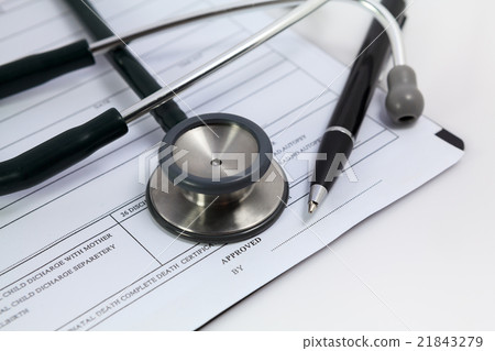 pen and stethoscope on blank Patient information 21843279