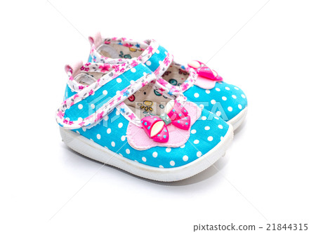 close-ups of blue baby shoes on white  21844315