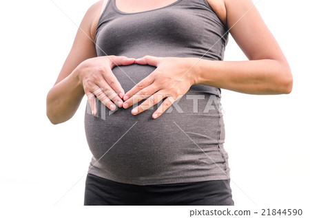 pregnant woman put her hands on belly over white pregnant woman put her hands on belly over white 21844590