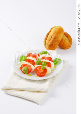 caprese salad with French bread 21847970