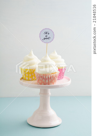 Three baby shower cupcakes 21848516
