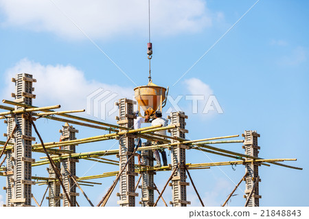 Crane working in construction on blue sky 21848843