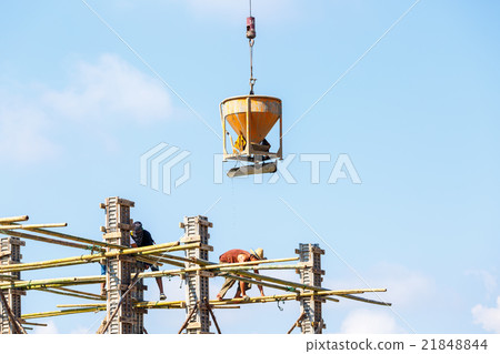 Crane working in construction on blue sky 21848844