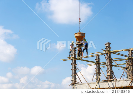 Crane working in construction on blue sky 21848846