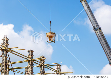 Crane working in construction on blue sky Crane working in construction on blue sky 21848847