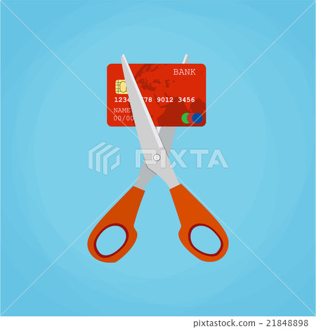 Red credit card cutting by the scissors. 21848898