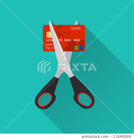 Red credit card cutting by the scissors.  21848899