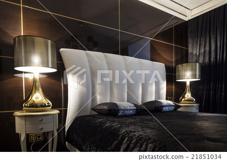 Interior bedroom bed in dark colors Interior bedroom bed in dark colors 21851034