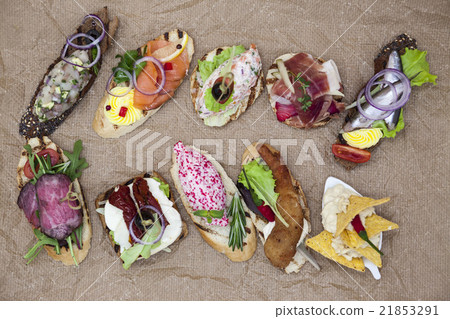Set of Spanish tapas on the textiles background  21853291