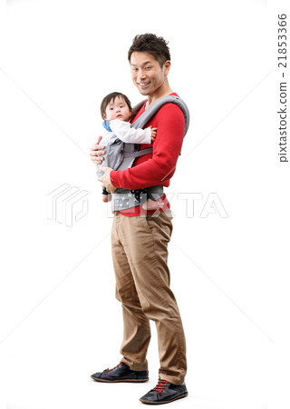 A whole body image of a young father holding a baby 21853366