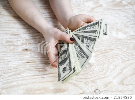 Money in hands Money in hands 21854580