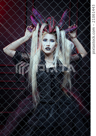 Woman behind a lattice. Woman behind a lattice. 21861443