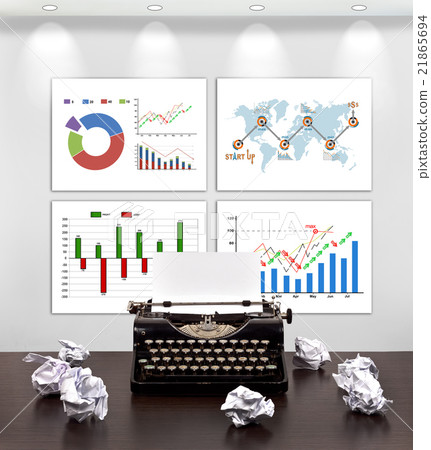 Typewriter and four placards with start up concept 21865694