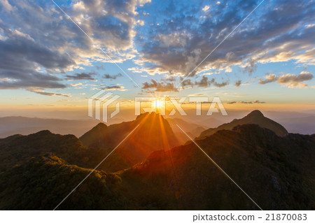 Layer of mountains and mist at sunset time 21870083
