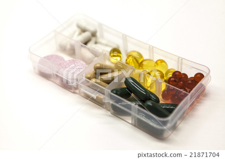 the pills in the box for drugs closeup the pills in the box for drugs closeup 21871704