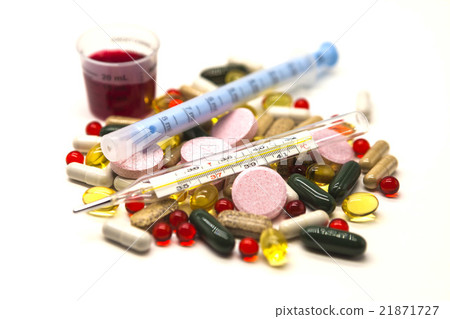 Different pills, medications with a syringe 21871727