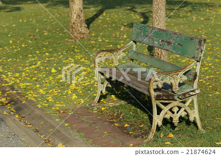 Wooden bench in park. Wooden bench in park. 21874624