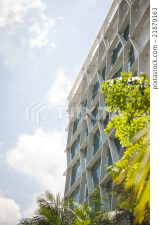 Hotel with beautiful garden surrounding. Hotel with beautiful garden surrounding. 21879163