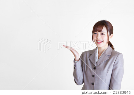 A young woman in suit shape to introduce Copy space 21883945