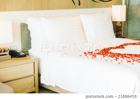 White pillow on bed White pillow on bed 21886458