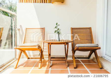 Empty chair and table Empty chair and table 21886795