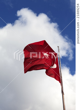 Turkish flag and blue sky with clouds Turkish flag and blue sky with clouds 21889254