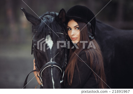Woman and Horse in Riding School 21891967