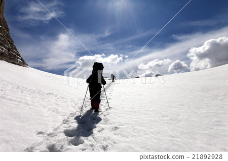 Two hikers on snow plateau Two hikers on snow plateau 21892928