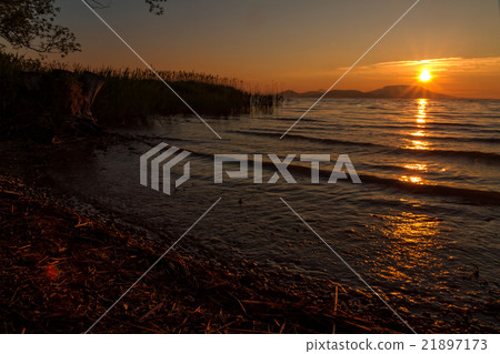 Beautiful sunrise over the lake Balaton of Hungary Beautiful sunrise over the lake Balaton of Hungary 21897173